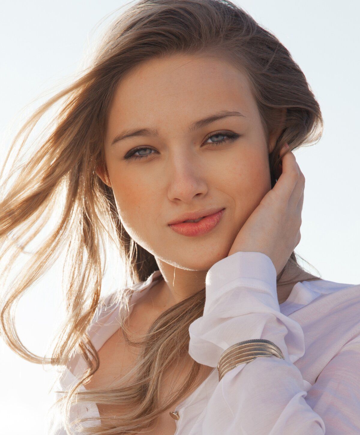 alleviate iv therapy patient model with long hair in sunlight.