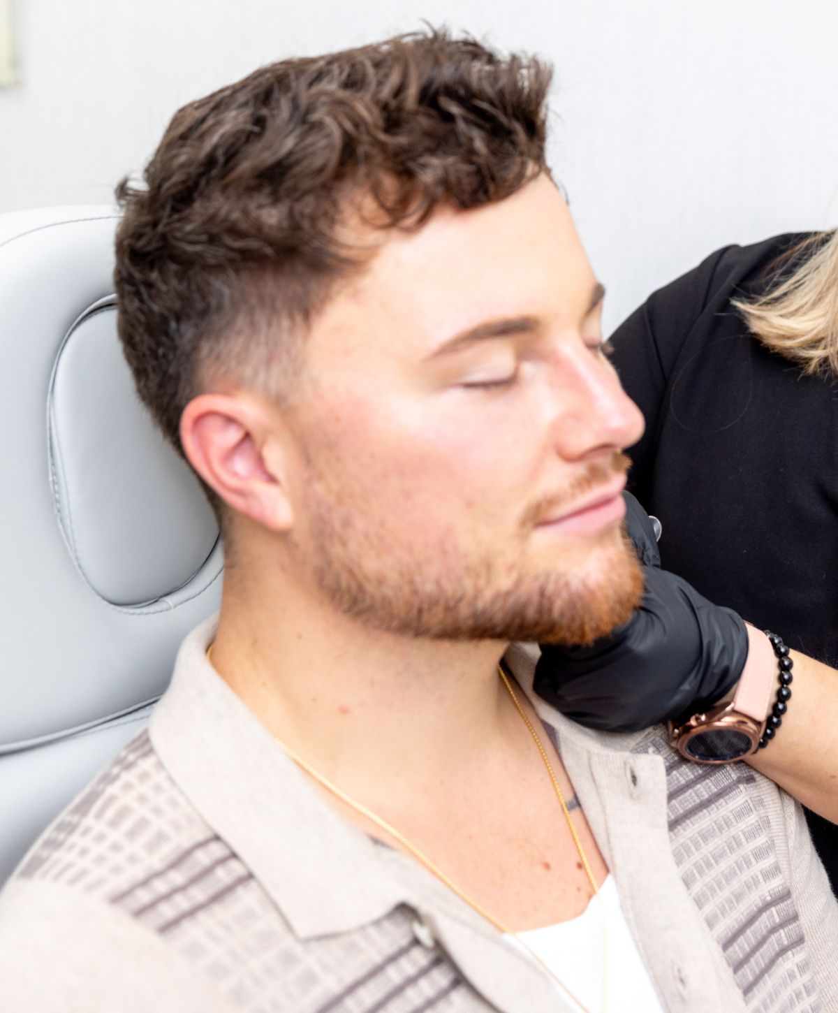 Male gonadorelin patient model receiving treatment in a med spa