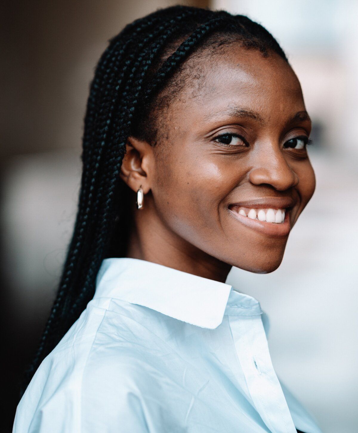 boynton beacn chemical peels patient model smiling in a white button up