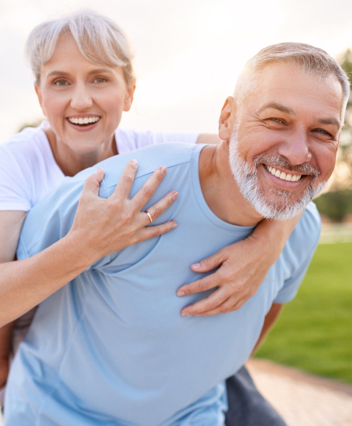 Happy stomach flu iv therapy patient model couple enjoying time together outdoors.
