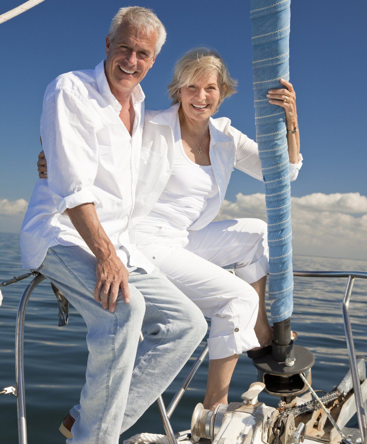 cold and flu iv therapy patient model couple enjoying a day sailing on calm waters.