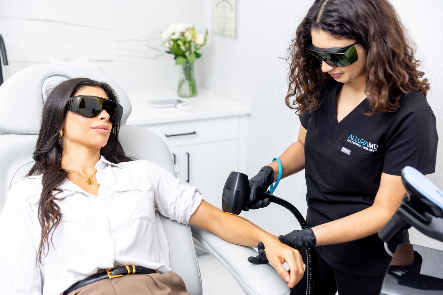Laser Hair Removal patient model getting treated on her arm