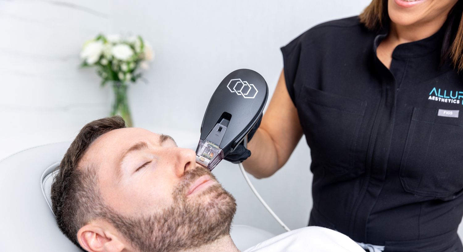 RF Microneedling patient model getting treatment on his face