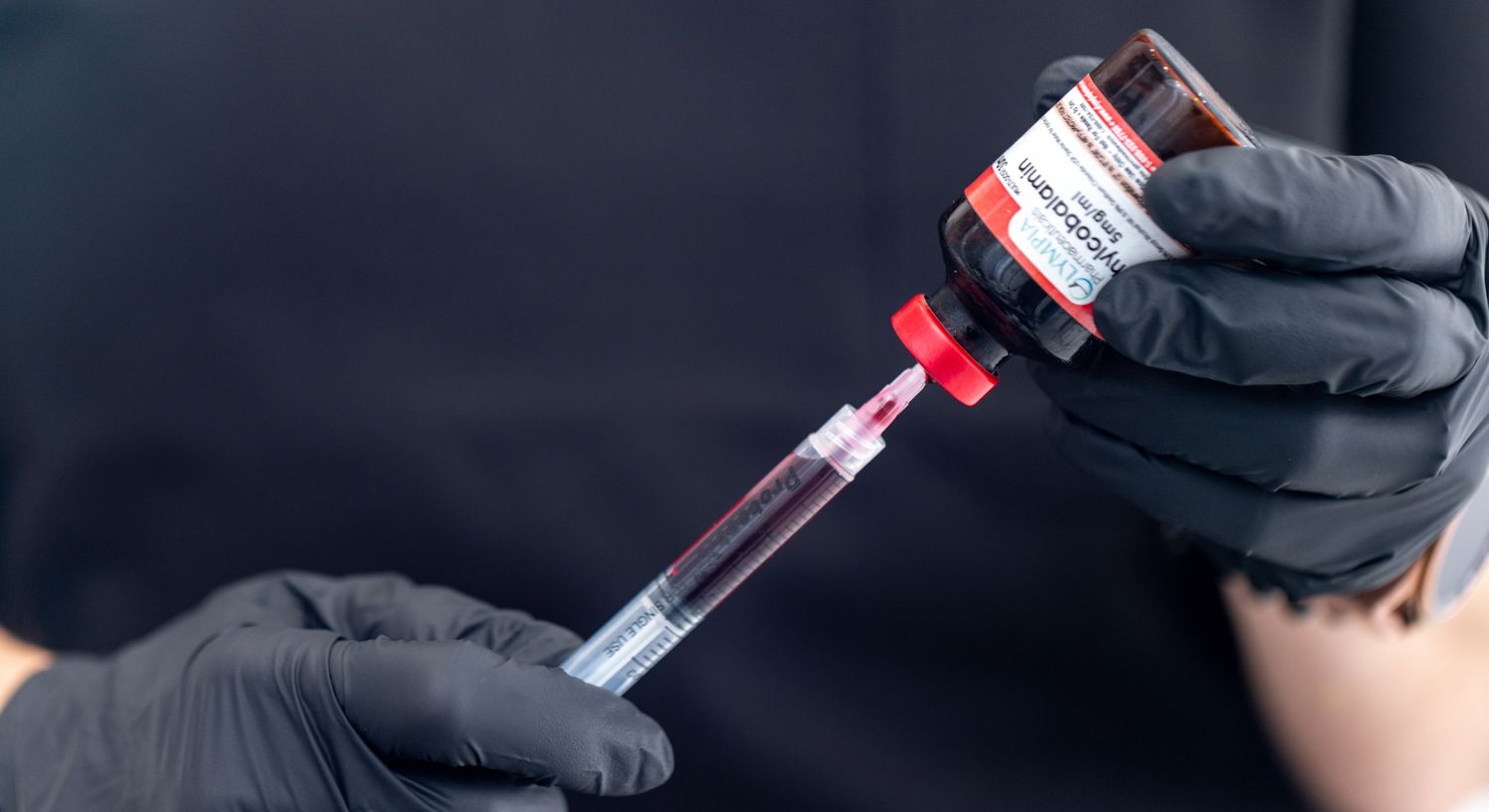 Vitamin Injections specialist preparing an injection