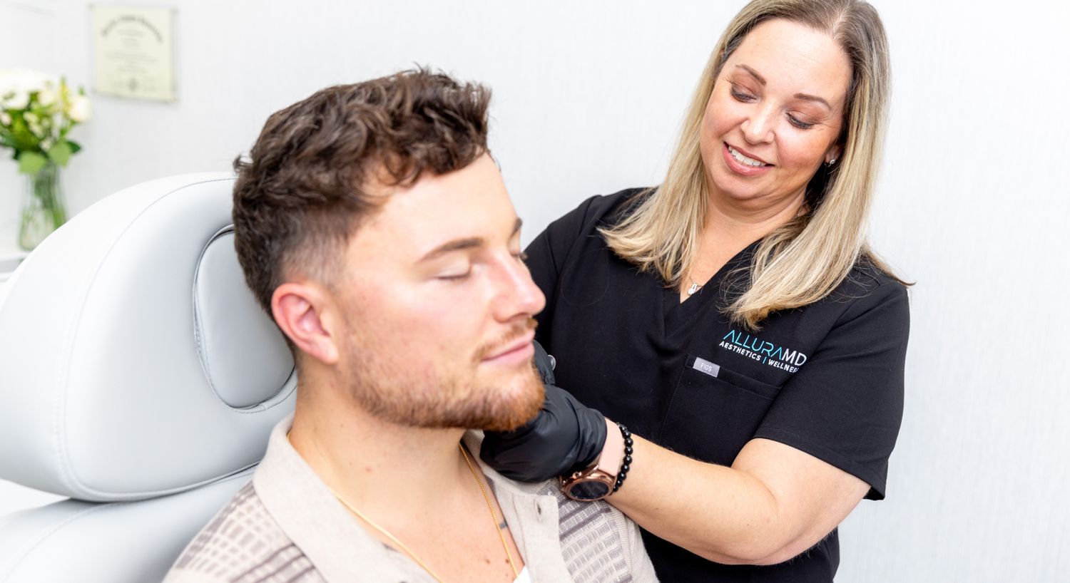 Xeomin patient model getting treatment performed on him at a med spa